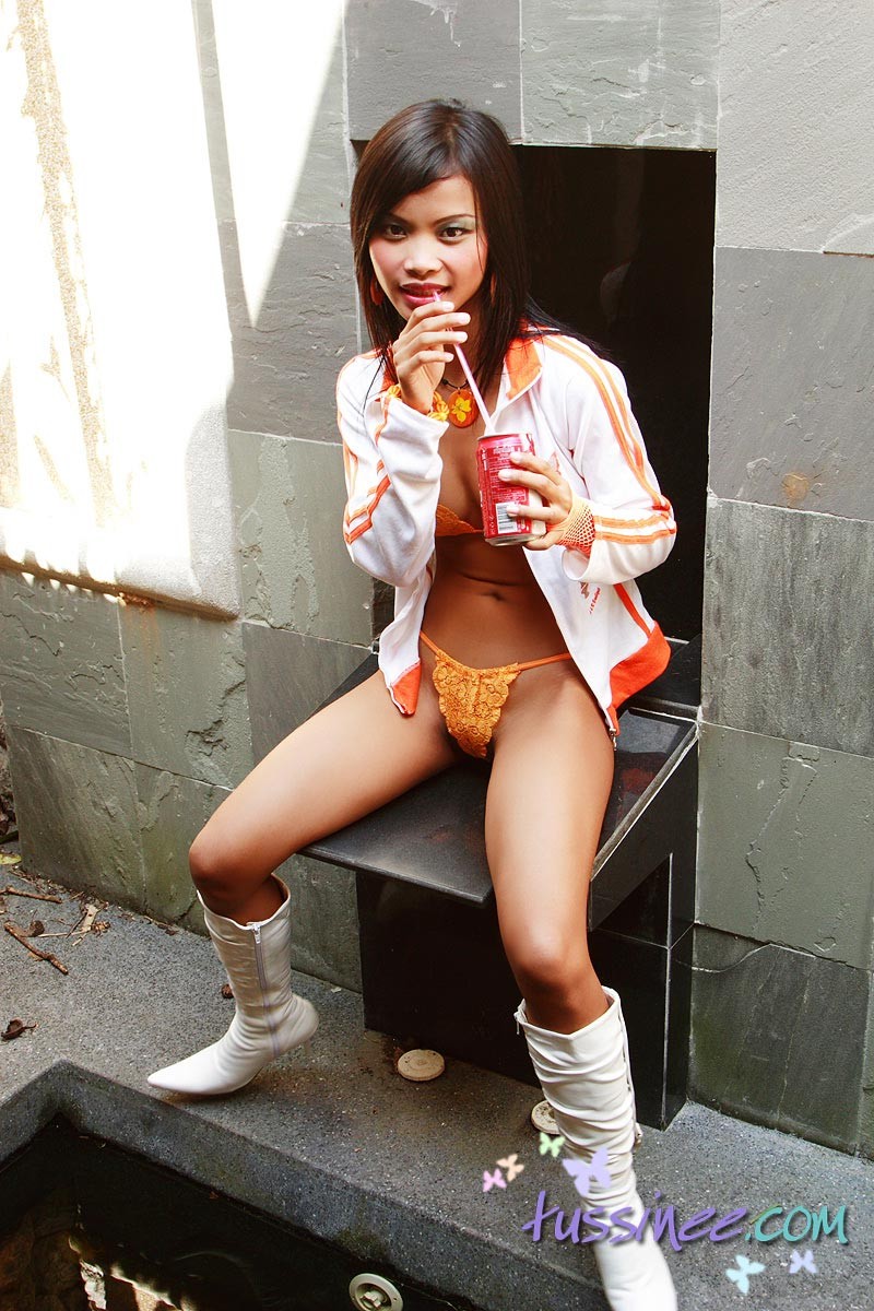 Thai teen girl drinks coke #69751230