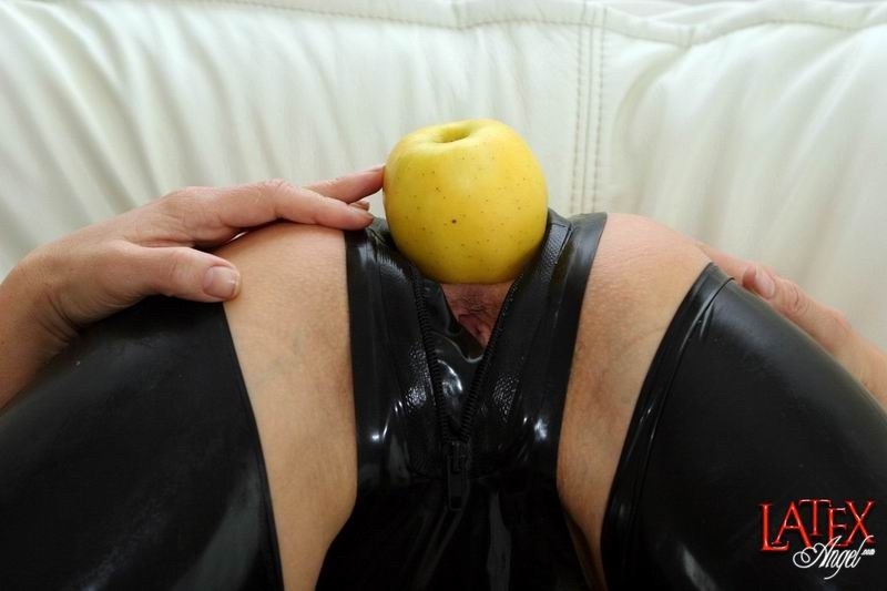 Latex Angel pushing apples into her asshole #68636898