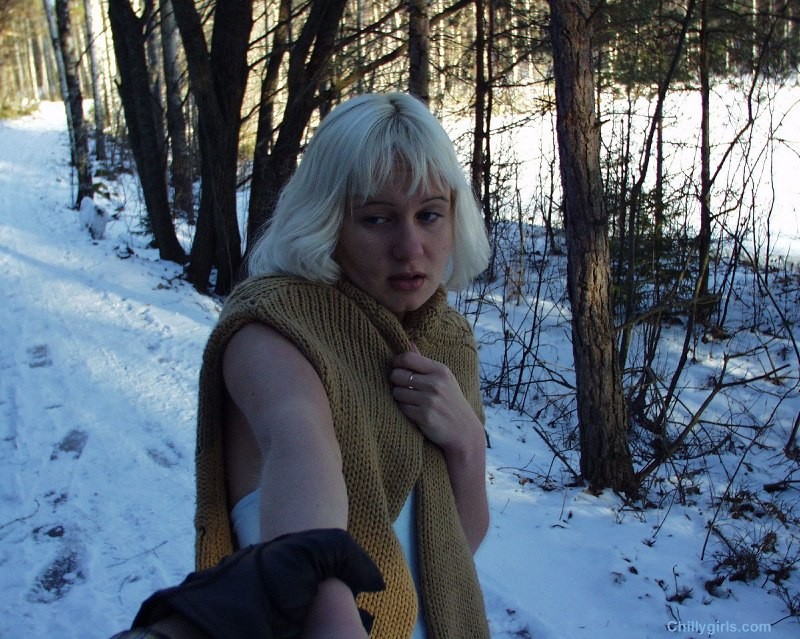 Girl bound between trees and tormented with snow #72225593