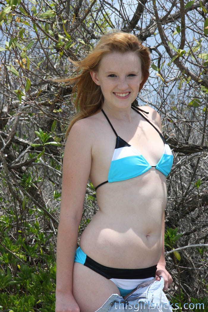 Innocent redhead teen strips off her bathing suit and sucks a di #74452655