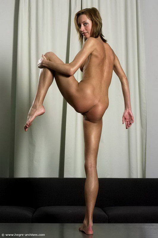 Sexy gymnast Yanna posing naked on a table #78952322