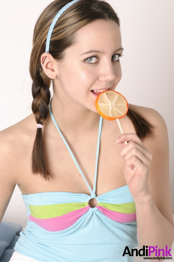 Cute teen girl licks lollypop #67551832