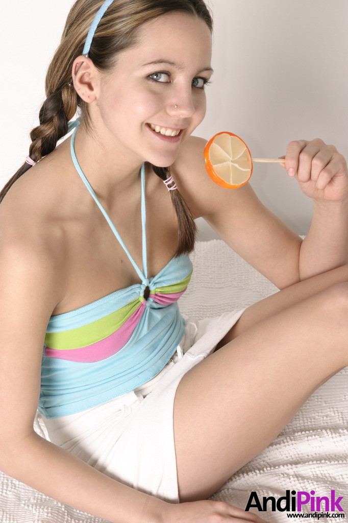 Cute teen girl licks lollypop #67551843