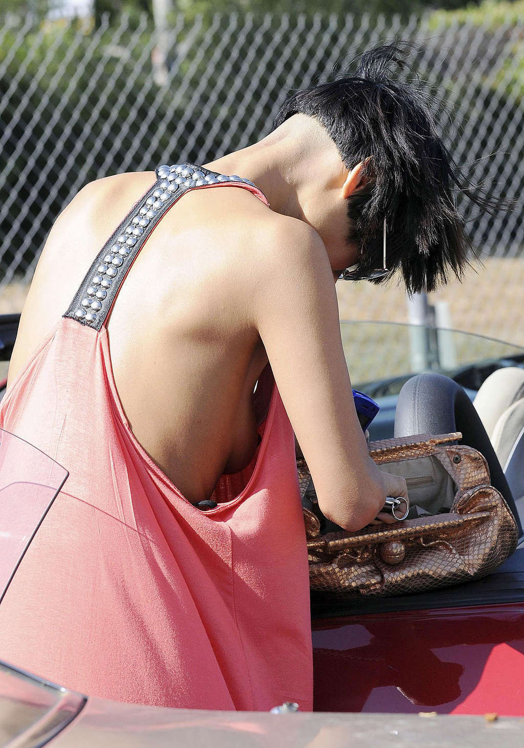 Bai Ling nipple slip by the car in public paparazzi shoots #75351959