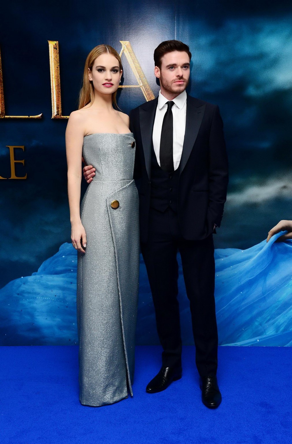 Lily James busty wearing a strapless dress at Disneys Cinderella premiere in Lon #75169725