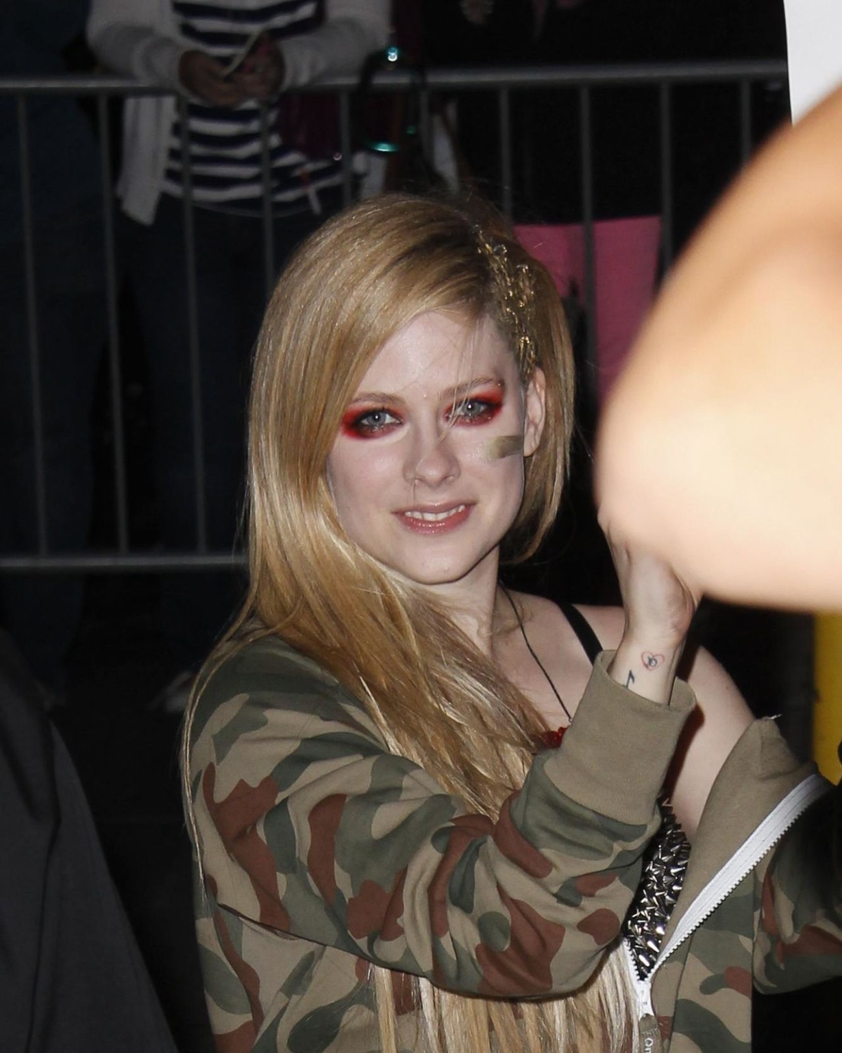 Avril Lavigne showing off her spiky bra at the 'Jimmy Kimmel Live' show in Holly #75218091