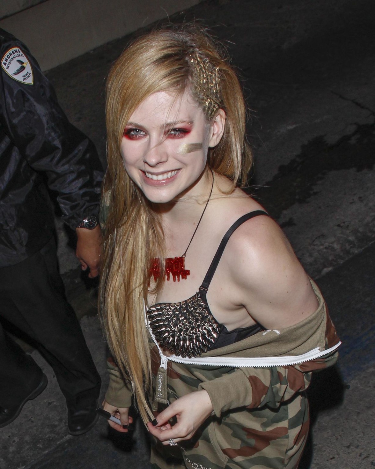 Avril Lavigne showing off her spiky bra at the 'Jimmy Kimmel Live' show in Holly #75218123