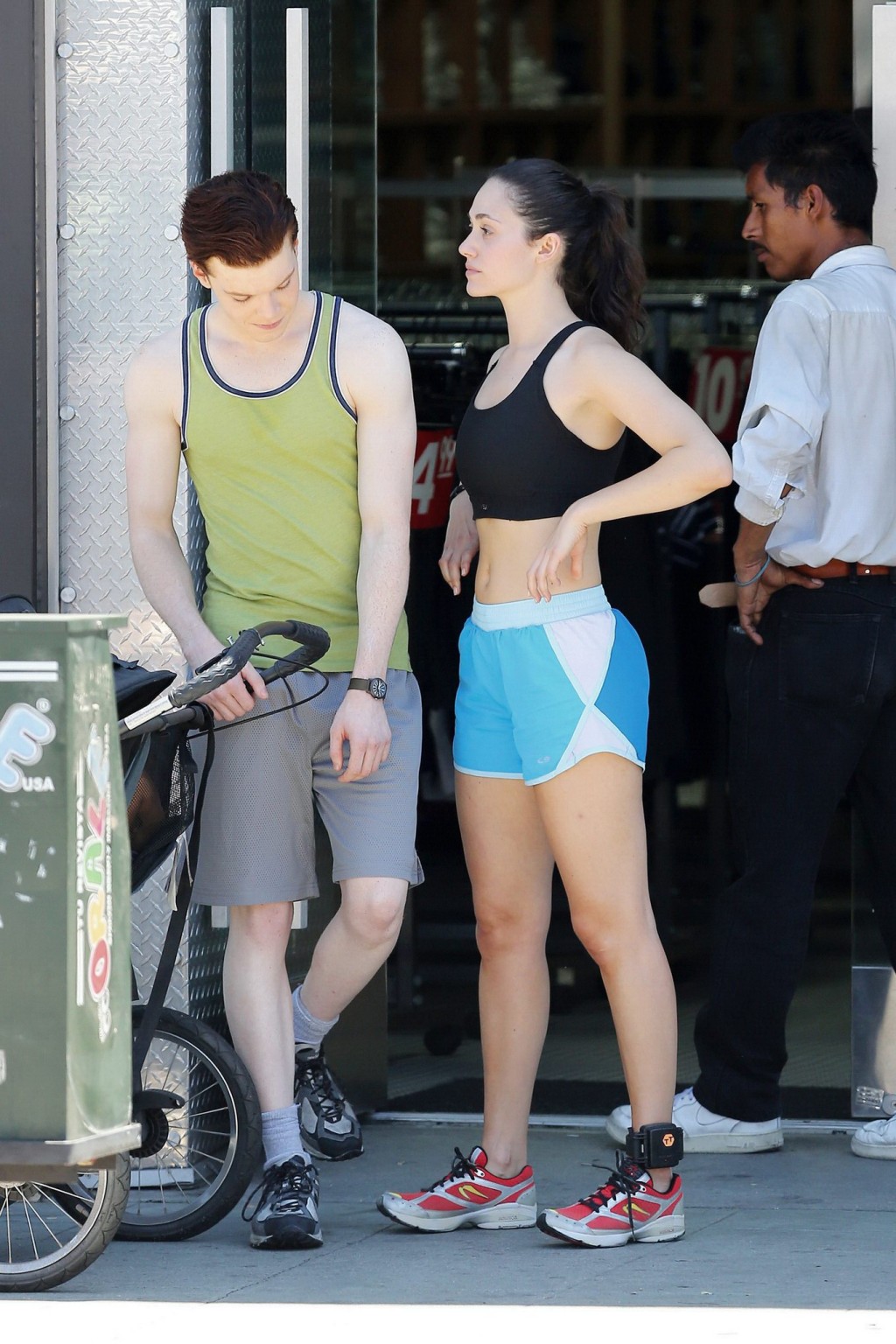 Emmy Rossum wearing black sport bra and shorts on the set of Shameless in Los An #75191184