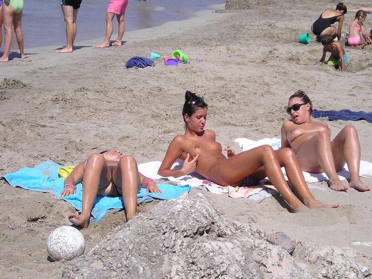 These two teen nudists play frisbee in the water #72255222