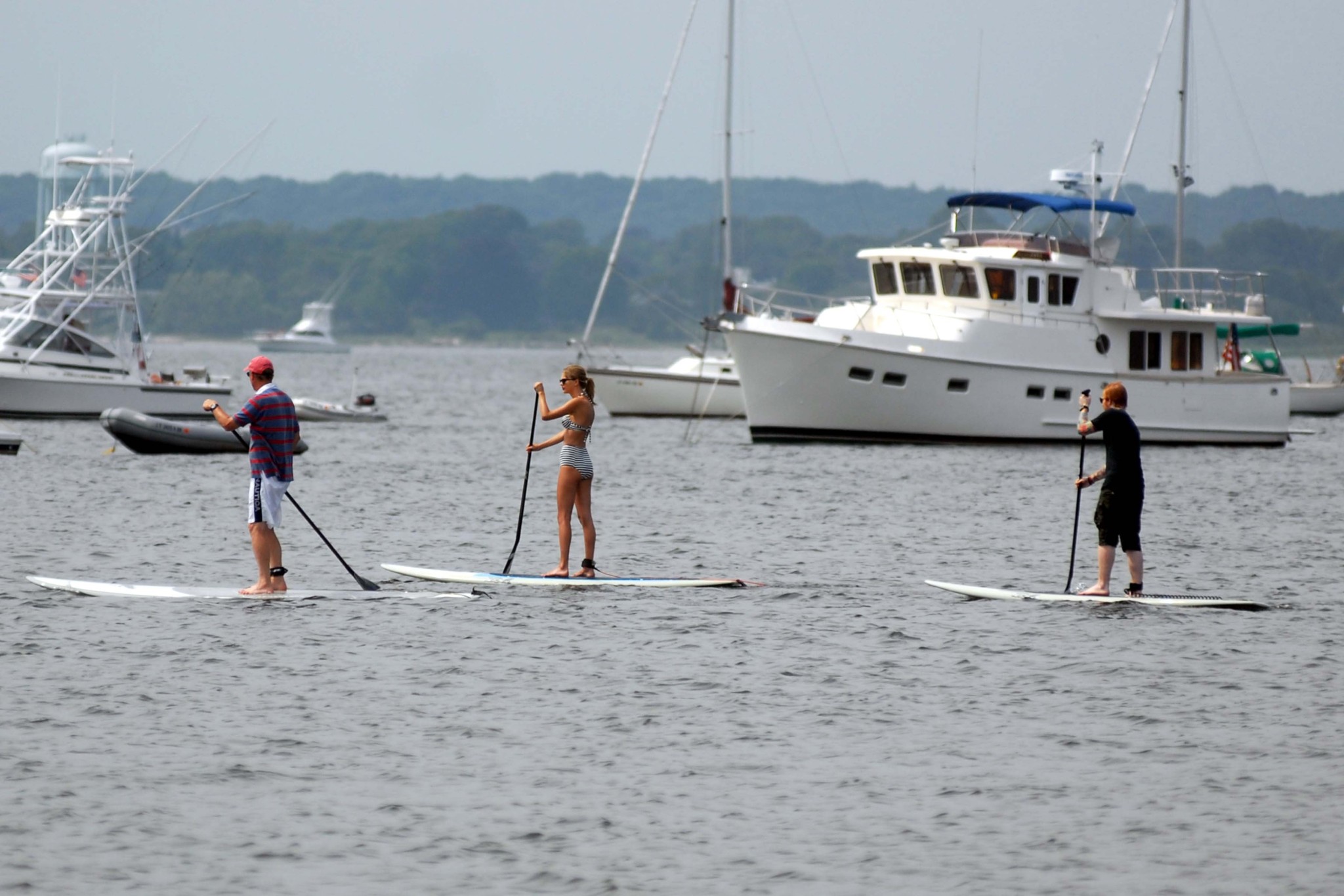 Taylor Swift in striped granny bikini paddleboarding in Westerly, Massachusetts #75223274