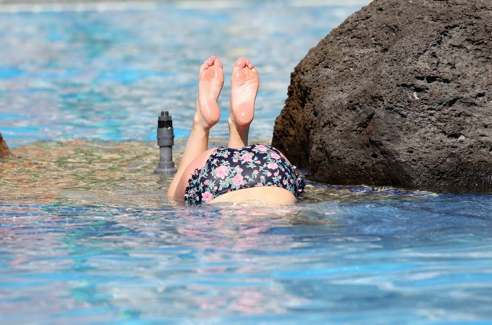 Jorgie Porter showing off her hot body in a skimpy floral bikini at the beach in #75172638