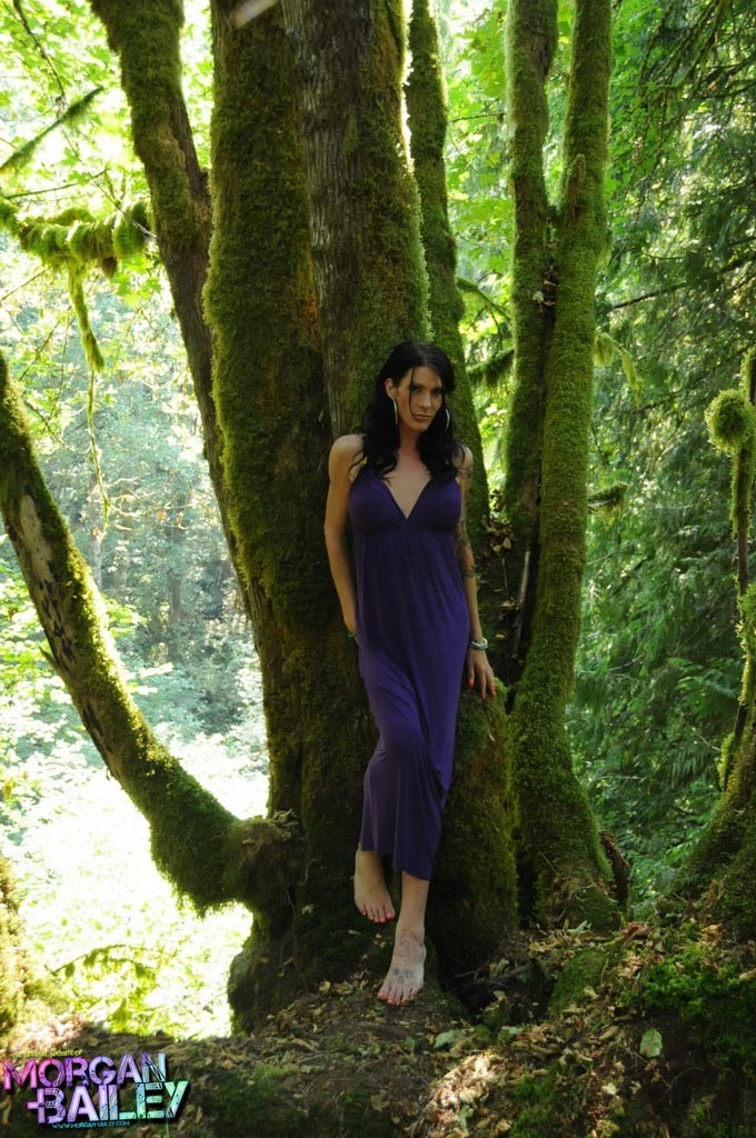 Brunette tgirl Morgan Bailey posing in the woods #79180031