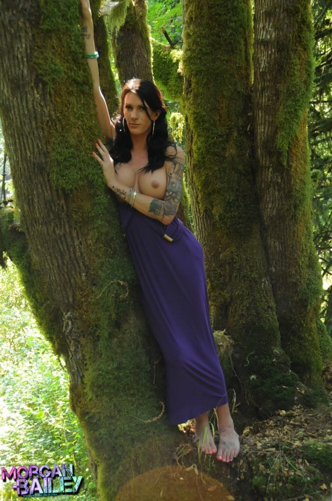 Brunette tgirl Morgan Bailey posing in the woods #79180037