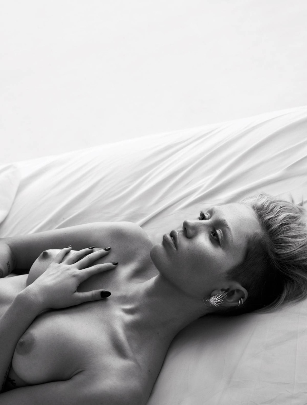 Miley Cyrus Topless In Magazine Photoshoot
