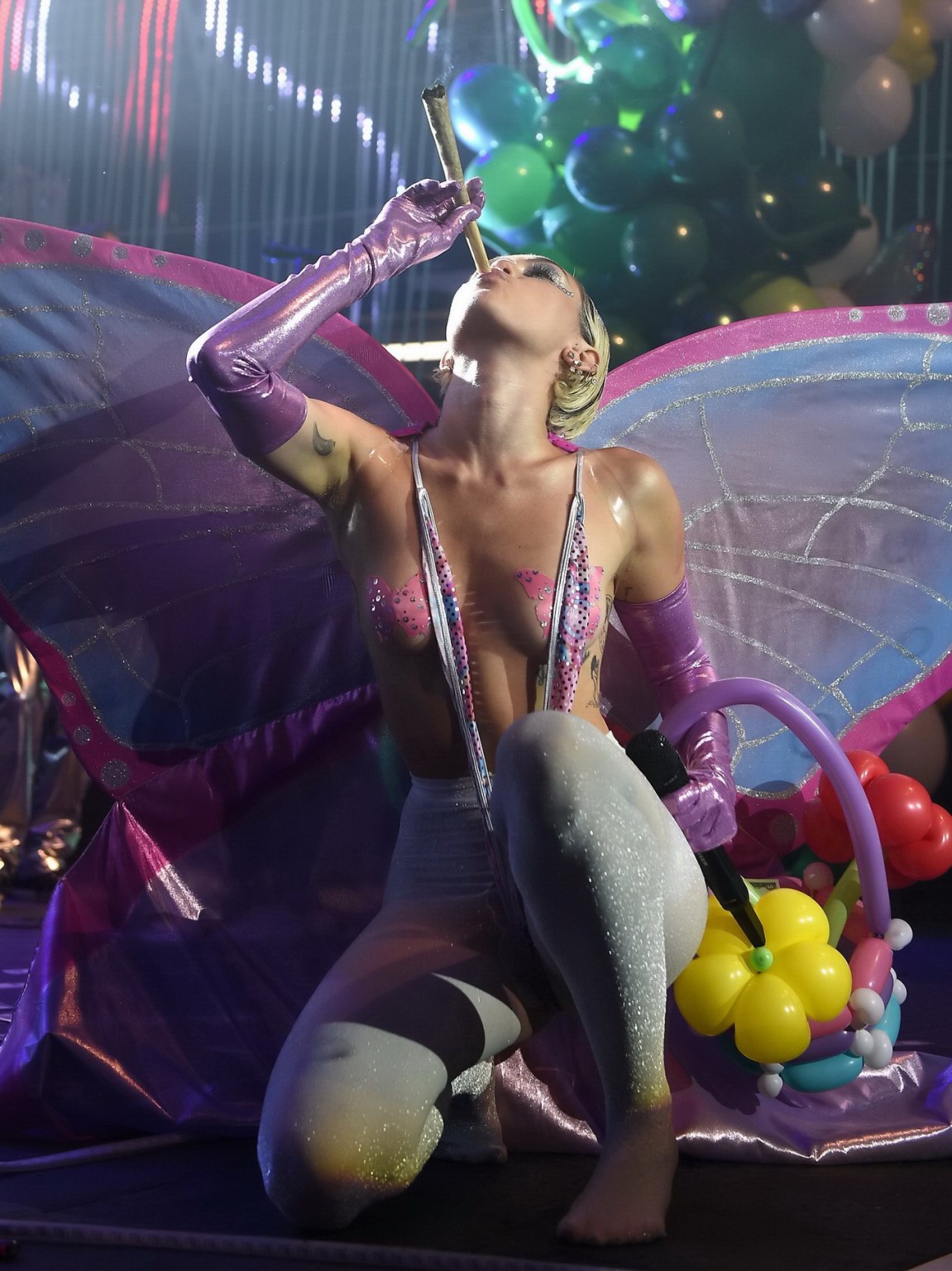 Miley Cyrus topless wearing butterfly pasties and pantyhose while performing at  #75164651