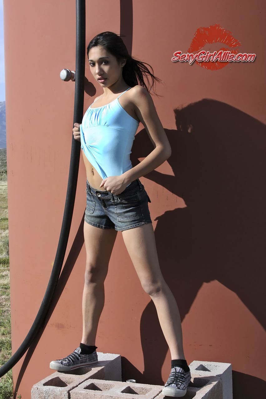 Skinny asian teen girl tease outdoors #69920261