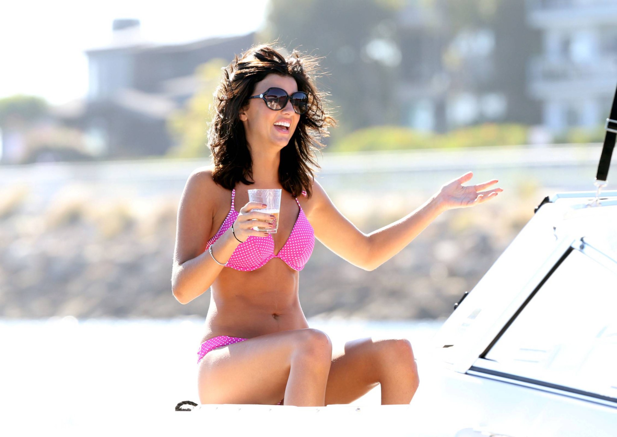 Lucy Mecklenburgh wearing pink polka dot bikini fights with a bottle of Moet at  #75220331