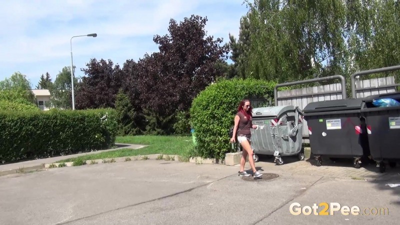 Pretty redhead pees outside in shorts #67484443