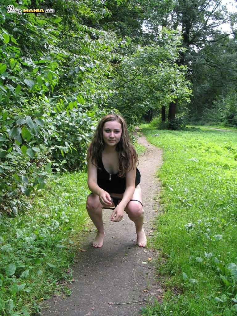 Cute girl peeing outdoors #76594932