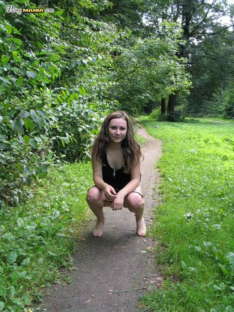 Cute girl peeing outdoors #76594937