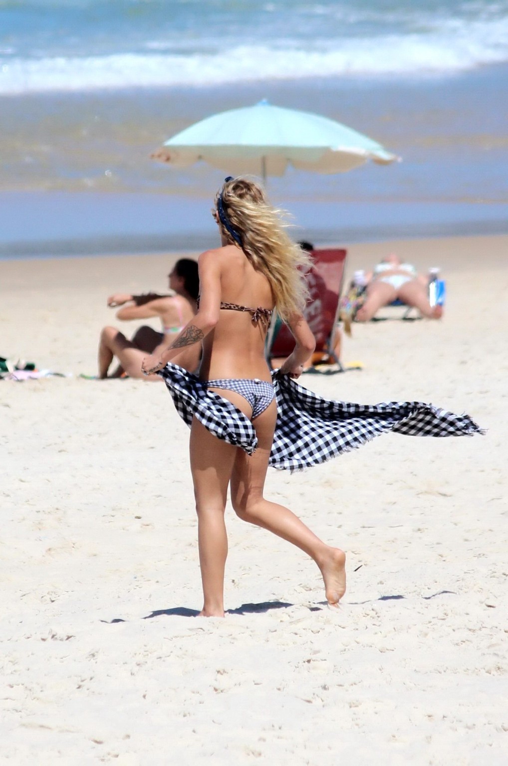 Alice Dellal bikini nip slip on a beach in Rio de Janeiro #75216523