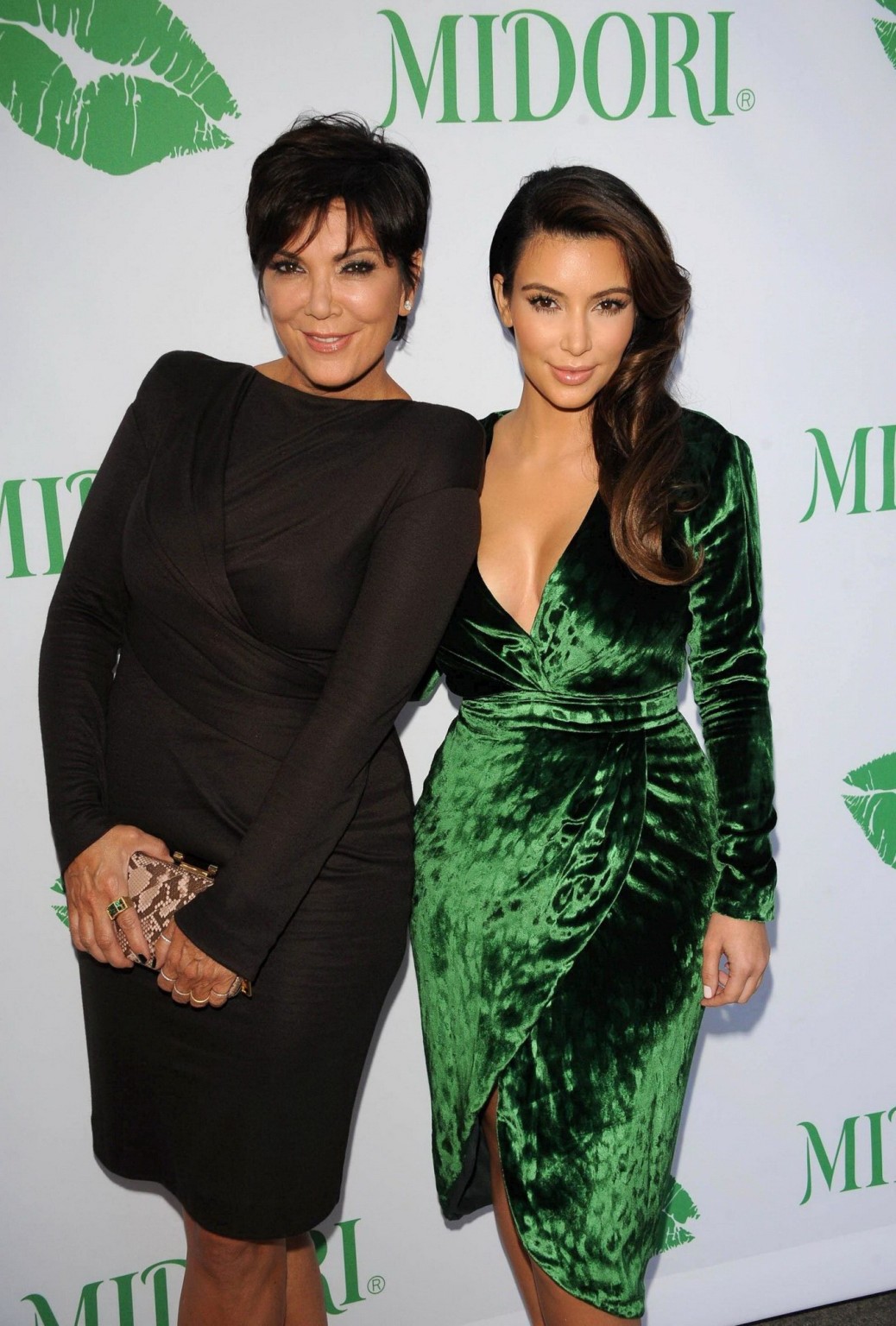 Kim Kardashian shows huge cleavage wearing green high slit dress at Midori Makeo #75251781