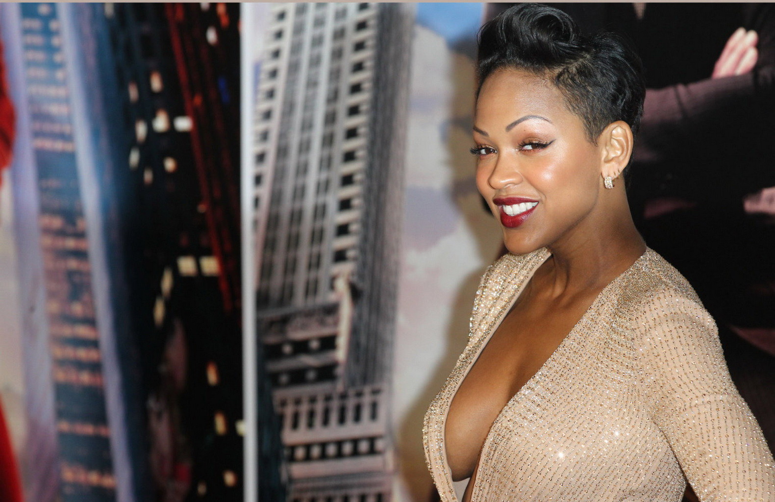 Meagan Good braless wearing gorgeous low cut  high slit dress at Anchorman 2:The