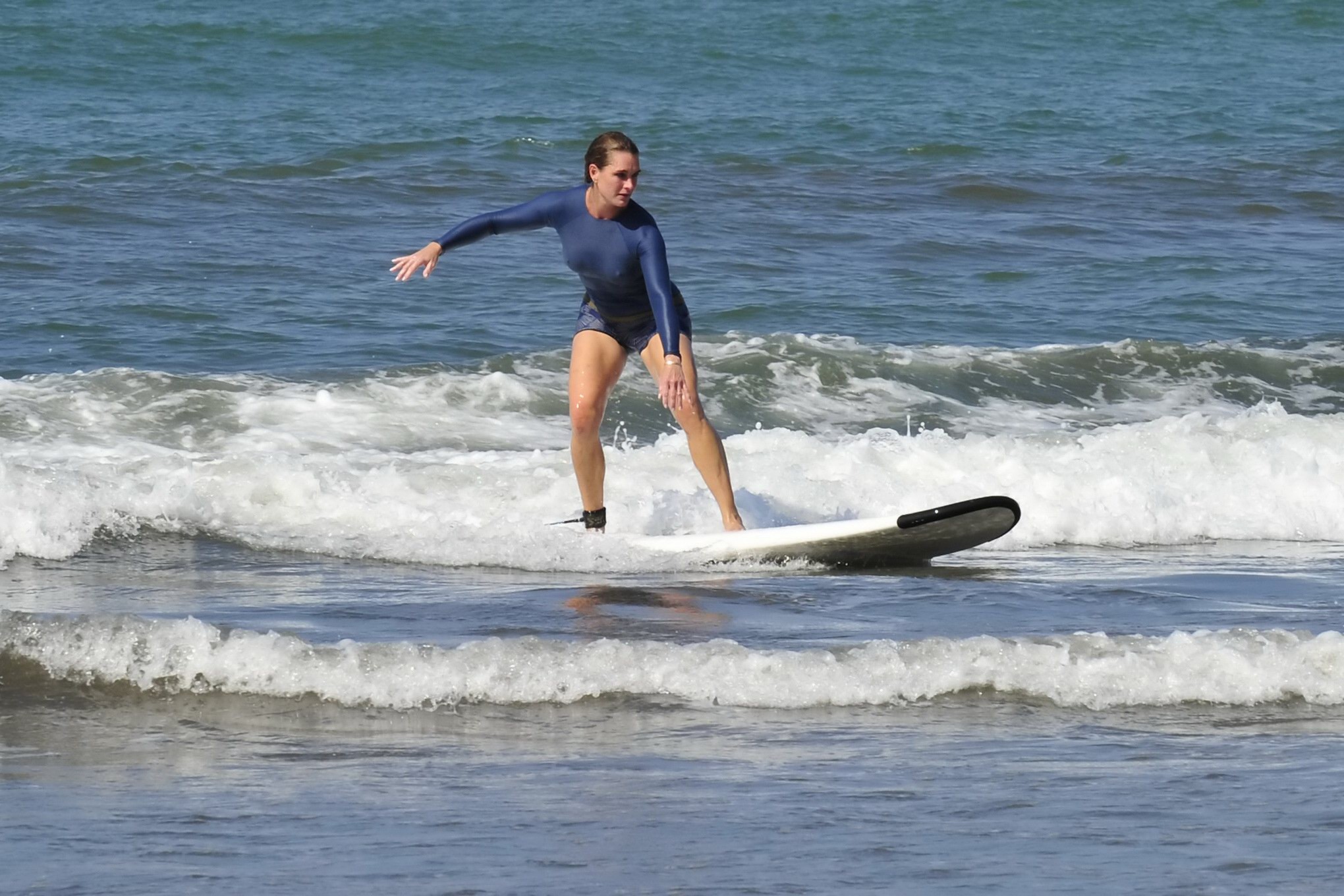 Brooke Shields busty showing her nipple pokies while surfing at the beach in Cos #75169797