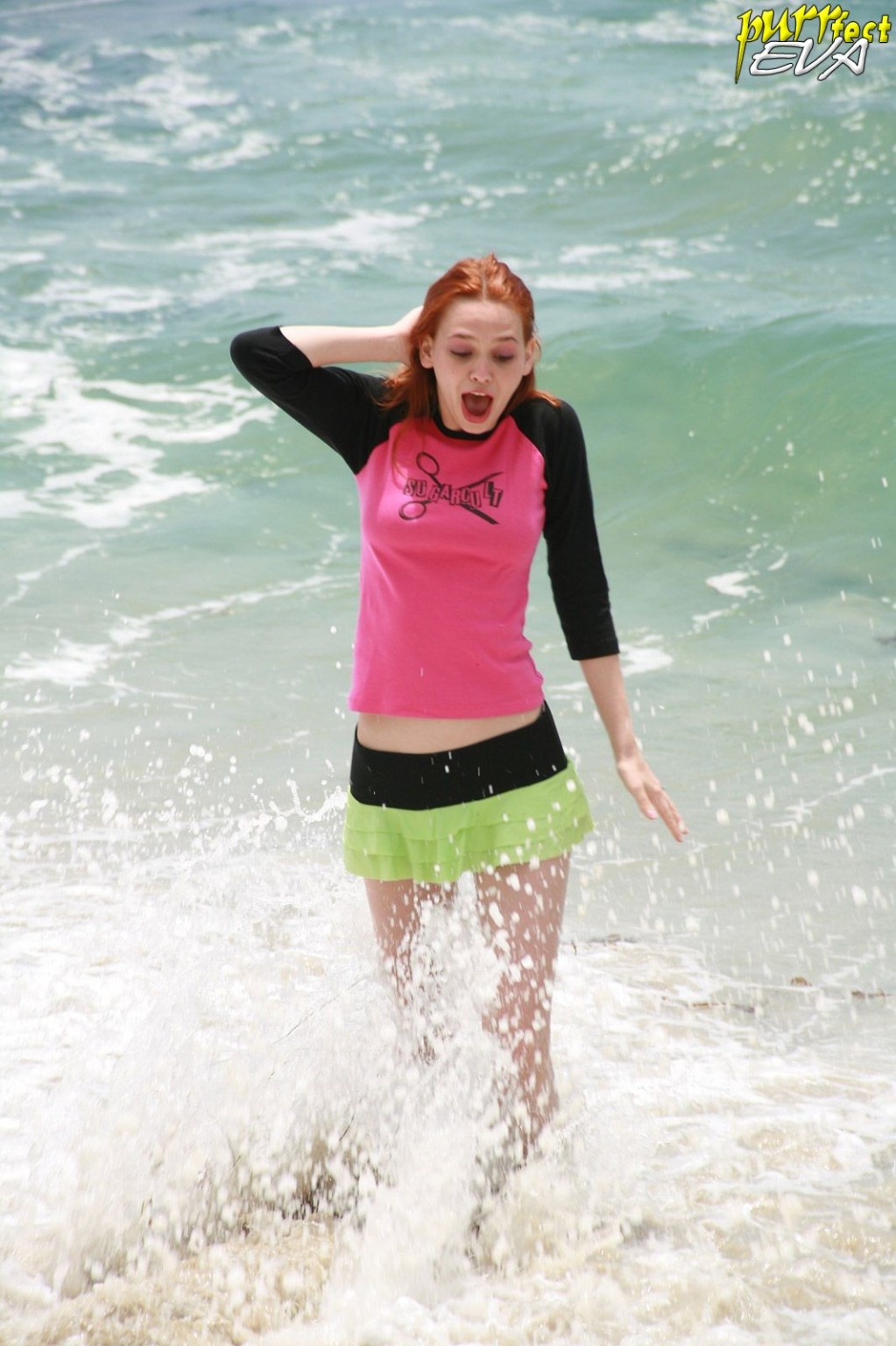 Redhead teen playing at the beach #72319615
