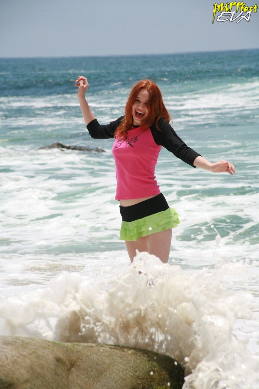 Redhead teen playing at the beach #72319638