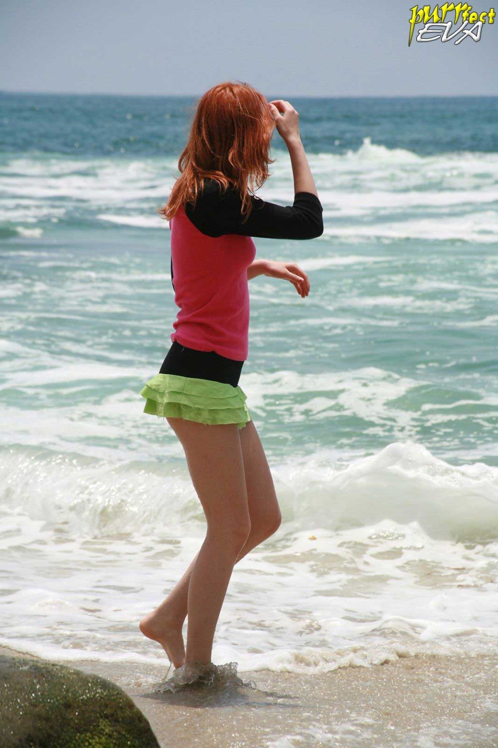 Redhead teen playing at the beach #72319648