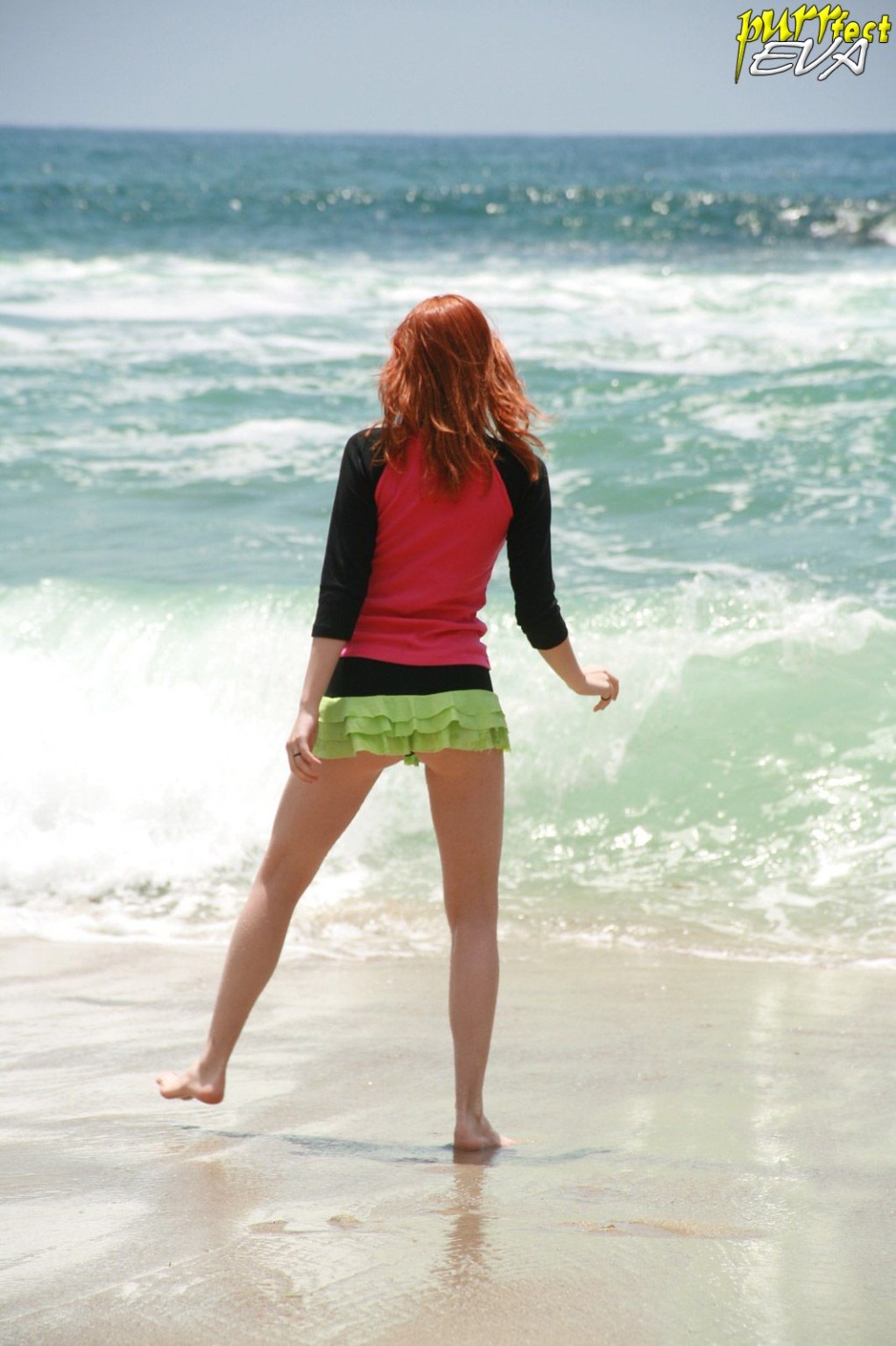 Redhead teen playing at the beach #72319699