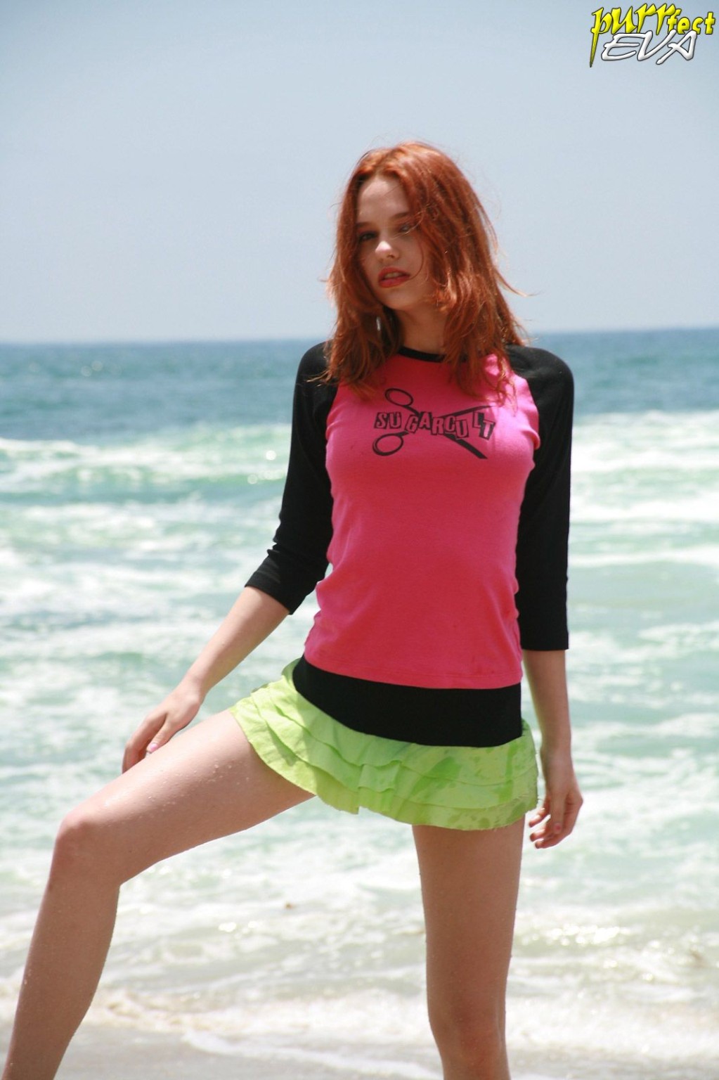 Redhead teen playing at the beach #72319732