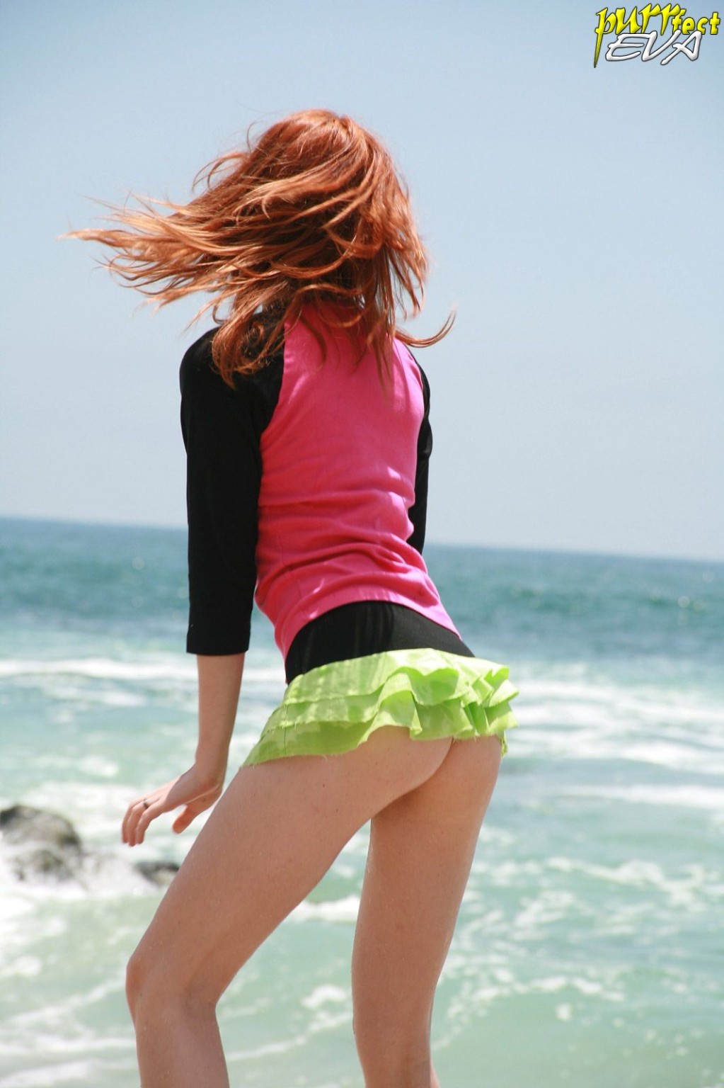 Redhead teen playing at the beach #72319745