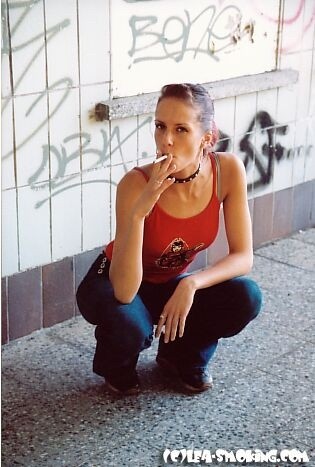 Teen smoking at the beach #72322667