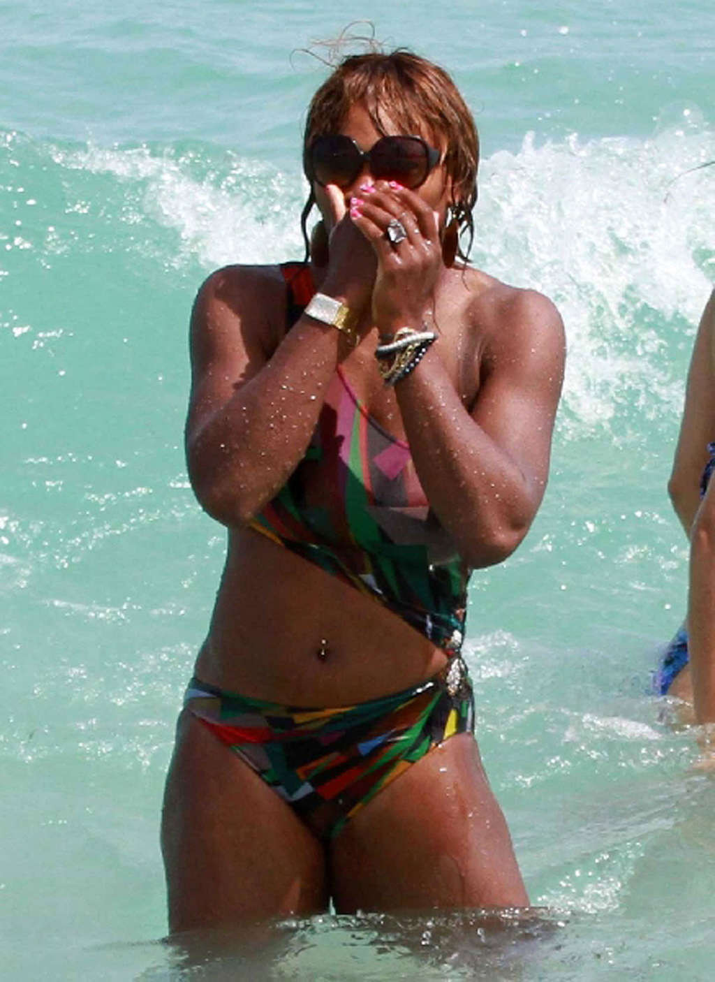 Serena Williams showing her sexy body in a colorful bikini #75355079