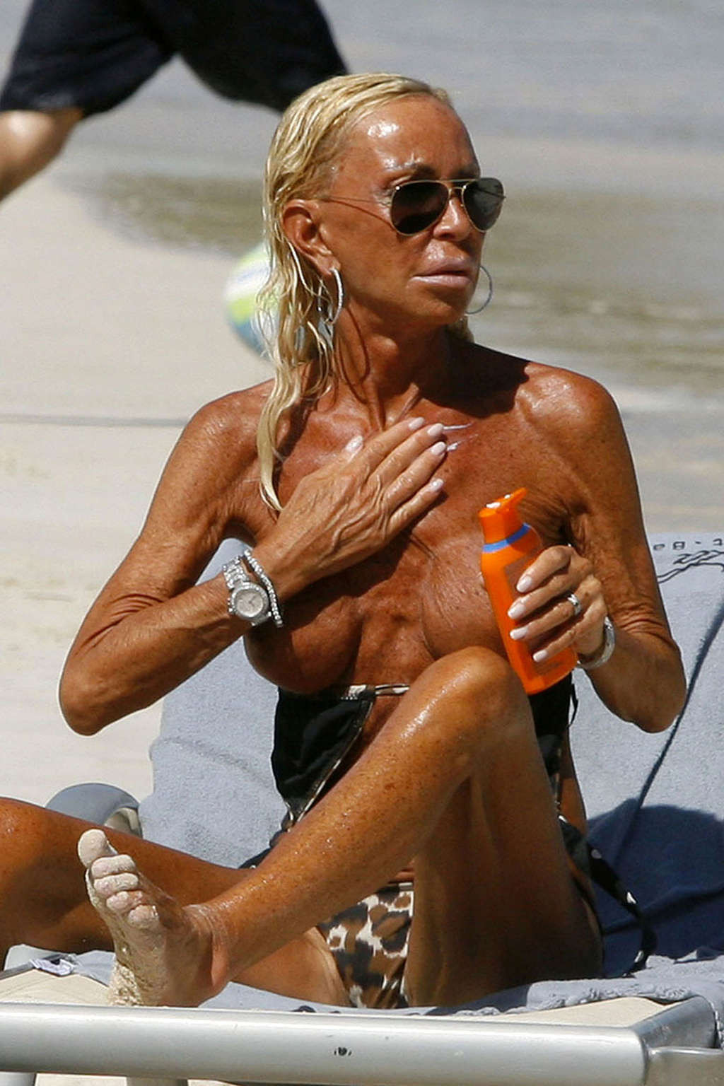 Donatella Versace cought exposing her big tits on beach paparazzi pictures #75362470