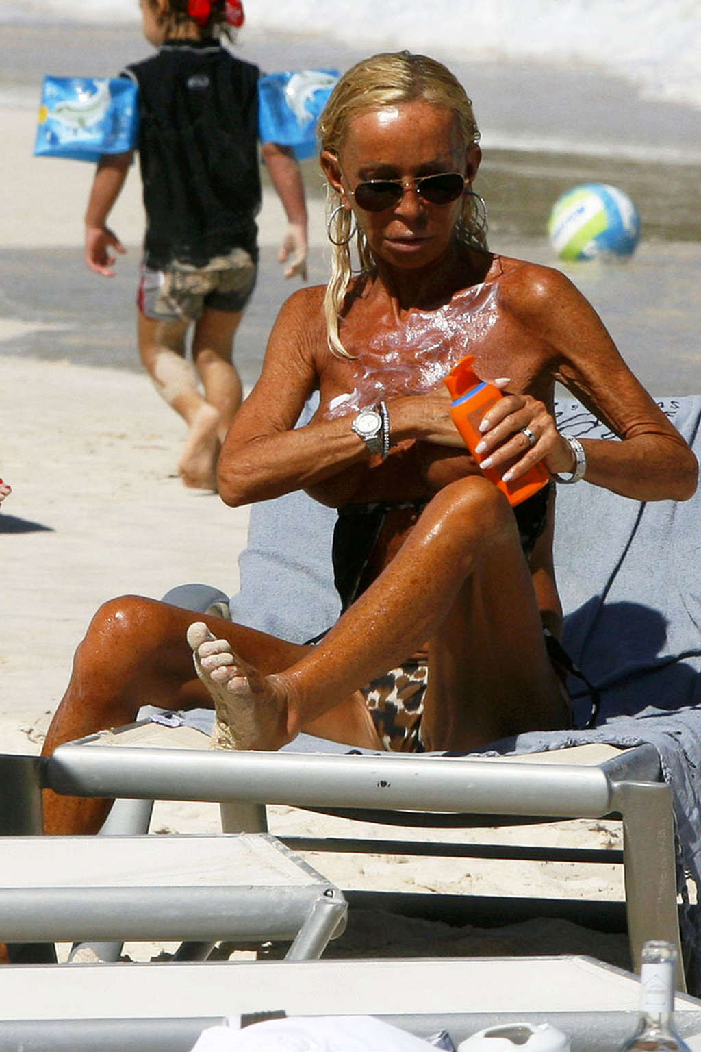 Donatella Versace cought exposing her big tits on beach paparazzi pictures #75362481
