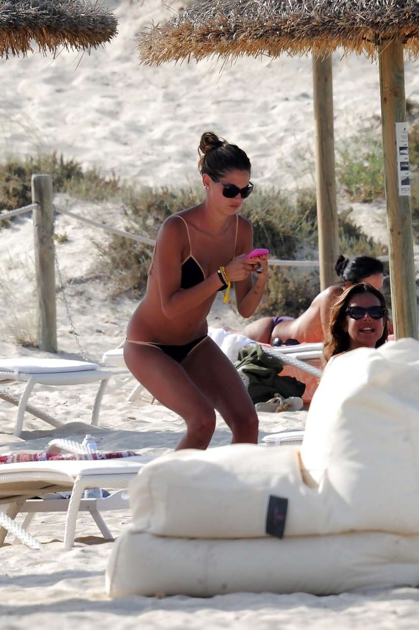 Melissa Satta showing her great ass in thong bikini on beach #75297476