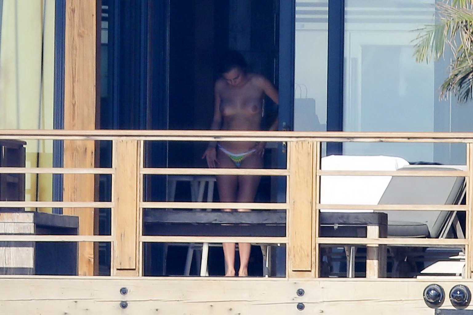Cara Delevingne tanning topless on a balcony in Malibu #75174875