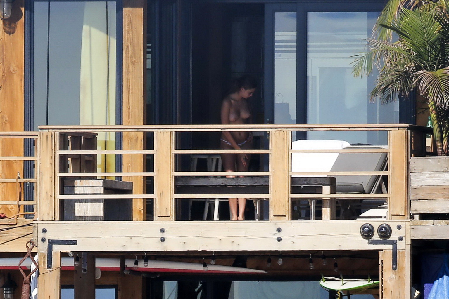 Cara Delevingne tanning topless on a balcony in Malibu #75174887