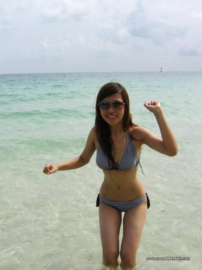 Sexy Asian exgirlfriend posing in a bikini outdoors #67583971