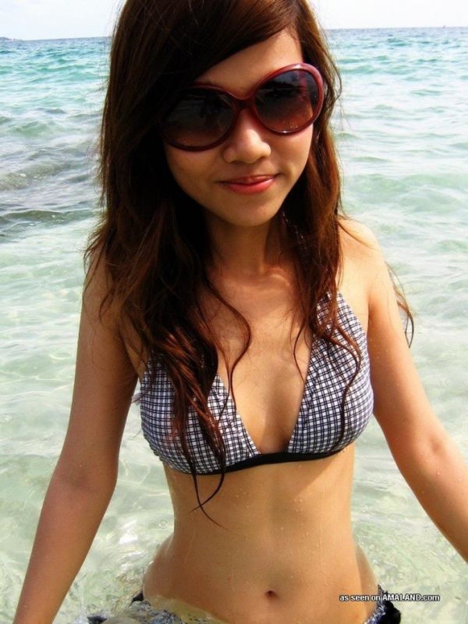 Sexy Asian exgirlfriend posing in a bikini outdoors #67583982