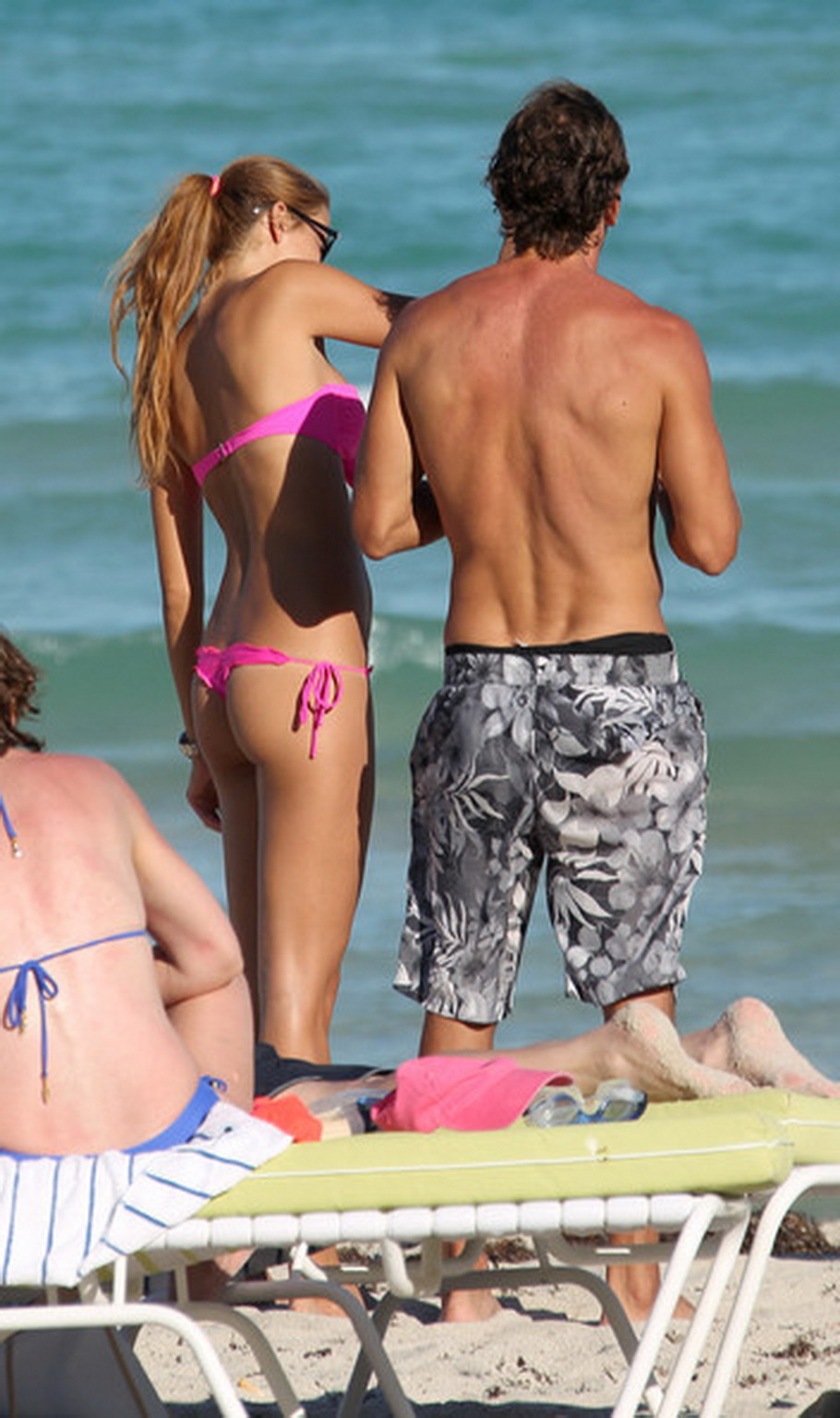 Lauren Stoner showing off her ass in pink thong bikini at the beach in Miami #75268969