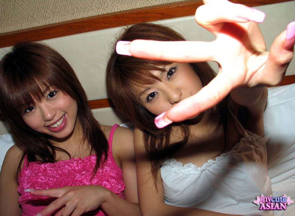 Two hot japanese lesbians kissing each other #69940911
