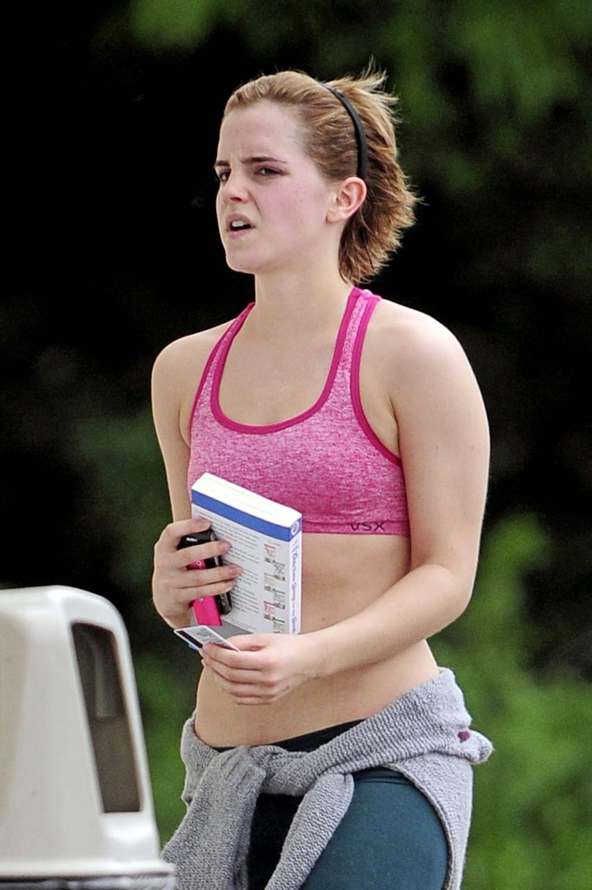Emma Watson exposing sexy body and nice tits in sports bra on street #75302597