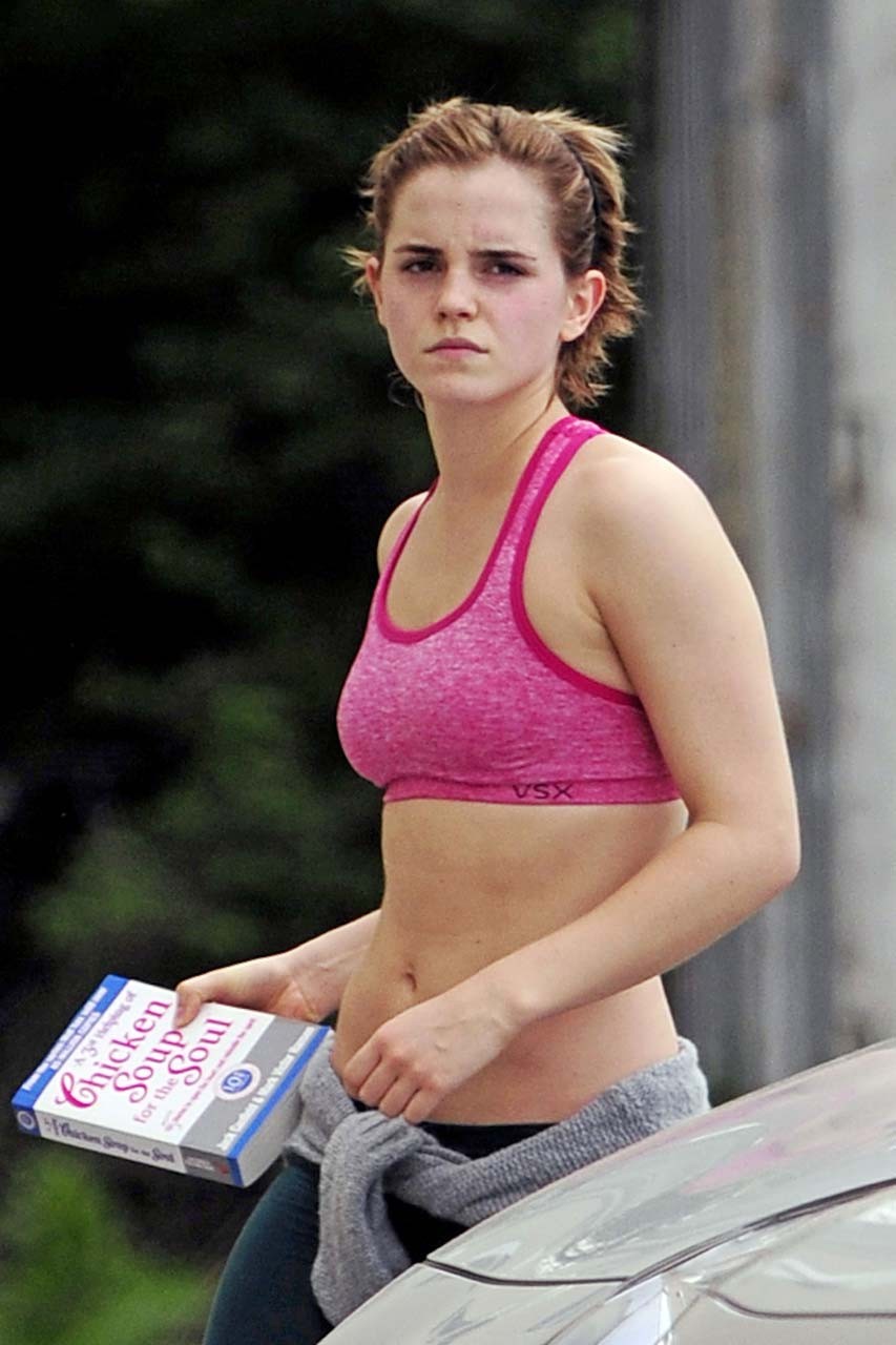 Emma Watson exposing sexy body and nice tits in sports bra on street #75302607