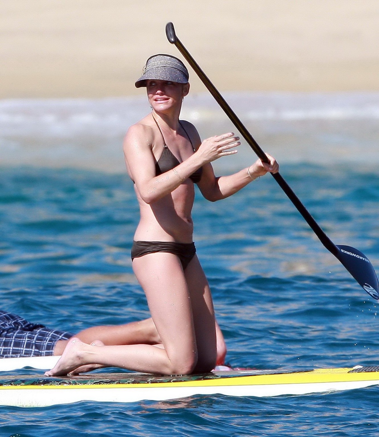 Cameron Diaz in sexy brown bikini paddle surfing on the beach in Mexico #75323146