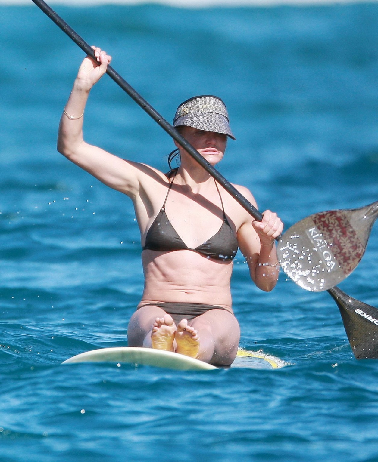 Cameron Diaz in sexy brown bikini paddle surfing on the beach in Mexico #75323186