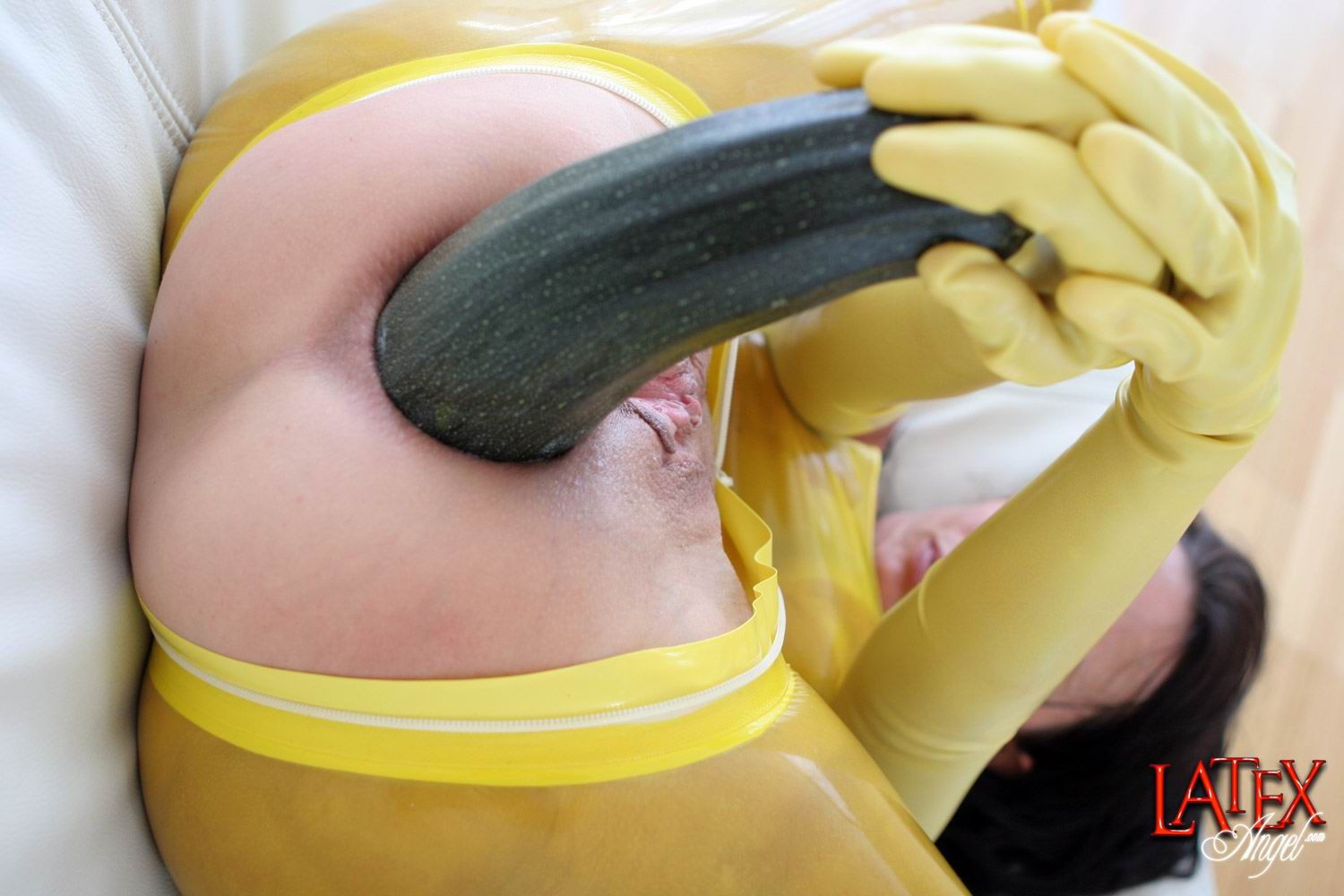 Latex Angel pushing big zucchini into her asshole #68636053